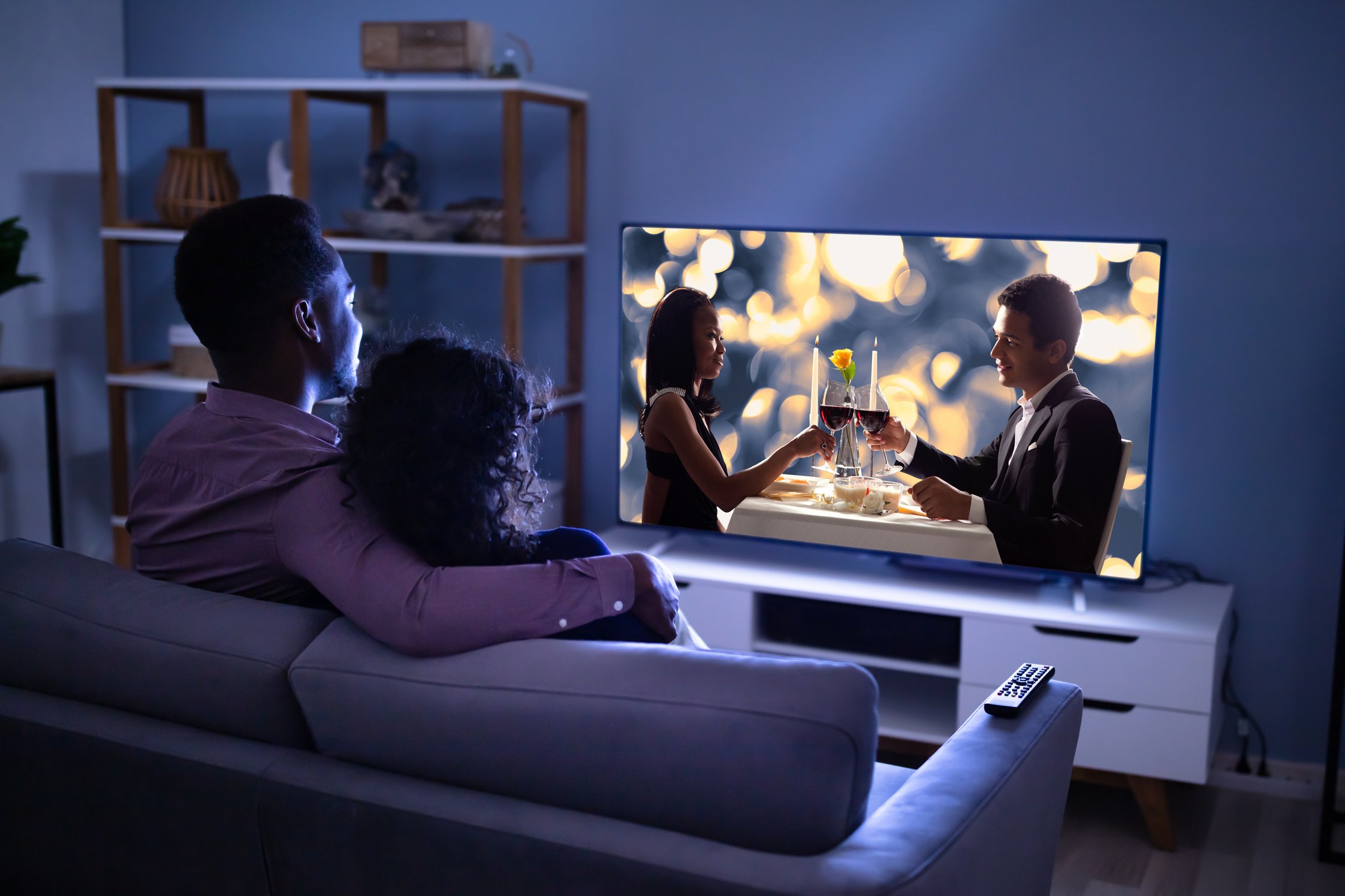 Affectionate Family Watching TV